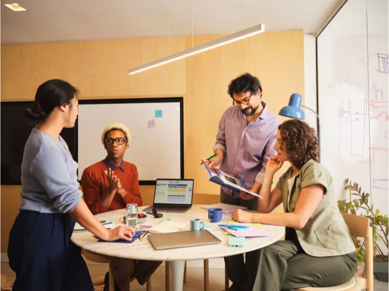 Team collaborating with Microsoft 365 cloud tools